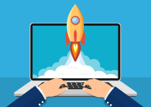 Successful Startup Business Concept. Laptop With Rocket Start Up